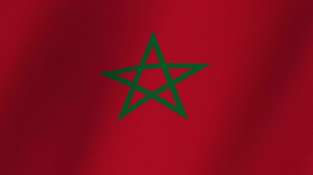 Waving flag of Morocco with a green pentagram star emblem on a red background, fabric texture