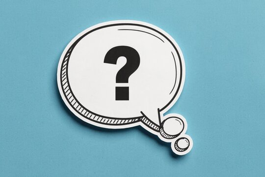 White paper cutout speech bubble with black question mark on blue background