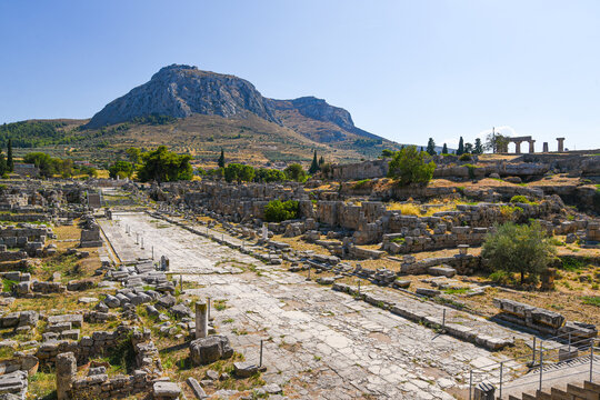 Ancient Corinth archaeological site ruins and Acrocorinth mountain in Greece