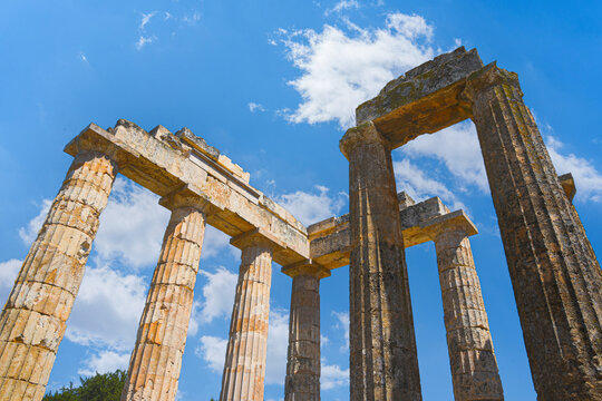 Temple of Zeus columns standing against blue sky in Nemea