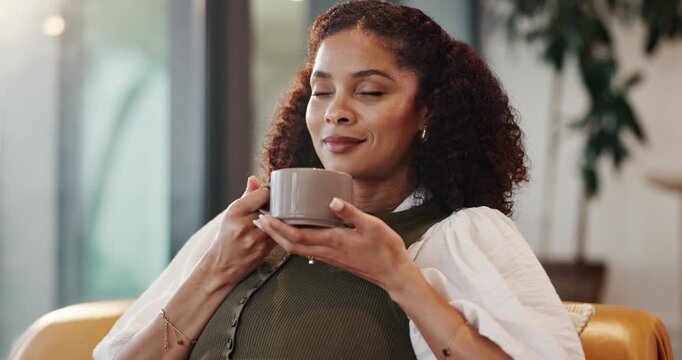 Relax, smell and woman with coffee cup in home, morning reflection and mindfulness for peaceful mindset. Smile, aroma and person with hot beverage for calm, stress relief and zen perspective on sofa