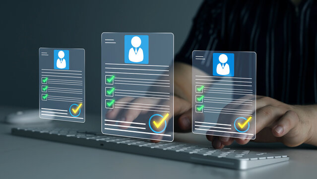 Digital documents with check marks verified staff records and online HR management. Employee approval process management.	
