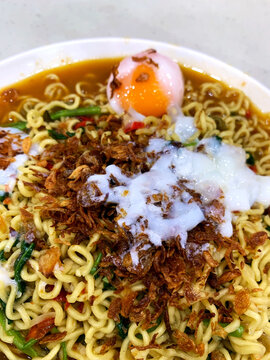 Close-up of Instant Noodles with Egg and Fried Shallots