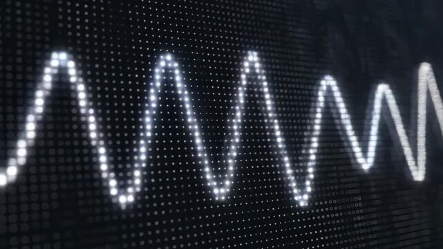 Audio waveform oscillating on oscilloscope screen with blue light overlay in darkness
