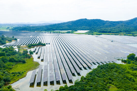 Aerial view of solar panel array on water surface for new energy power generation