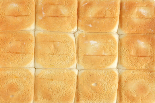 closeup bottom of bread roll buns background