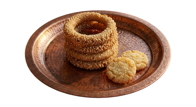 Traditional Nepalese Sel Roti and Anarsa Rice Flour Sweets on Vintage Brass Plate
