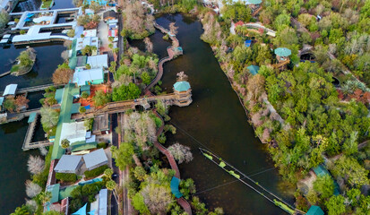 Drone view of green lagoon park with boardwalks in Orlando Florida © Moiseii Production