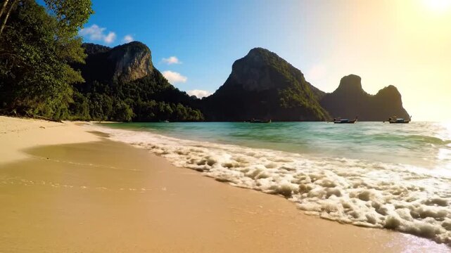 serene tropical beach scene with turquoise ocean waves lapping on the shore and lush green mountains in the background