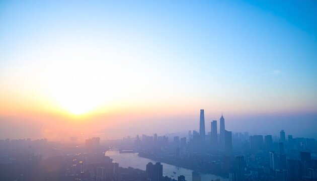 夕暮れ、朝焼けの都会のビル街のぼやけたイメージ画像　ビルのシルエット、ソフトフォーカス、背景ボケ