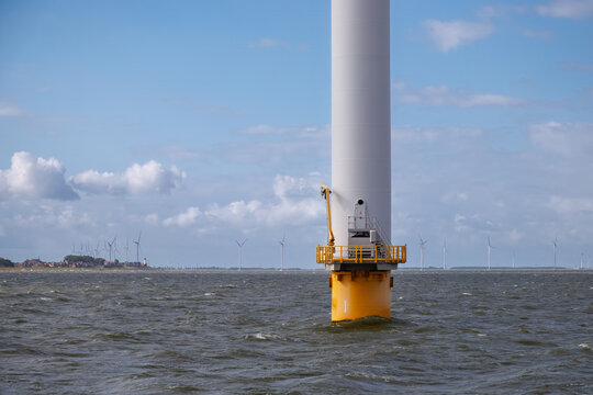 Wind Farm in the IJsselmeer with Urk in background