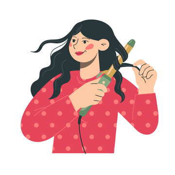 Young woman curling hair with curling iron beauty routine