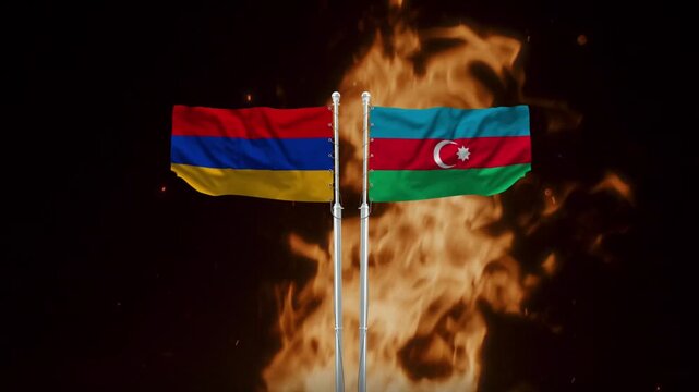 Armenian and Azerbaijani national flags waving fiercely against a background of burning fire, conflict video