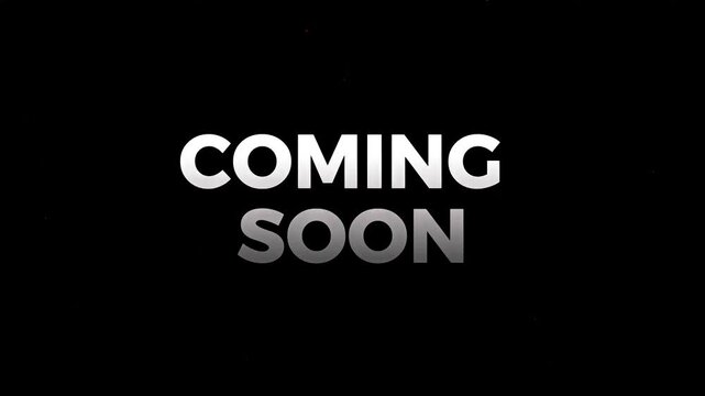 Minimalist coming soon text banner with silver gradient lettering on black background for teaser announcements and product launches