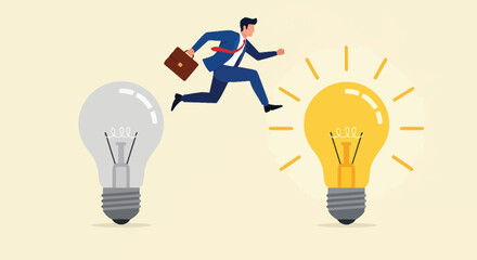 Business man jumping from turned off light bulb to glowing one representing innovative idea creation conceptual transition from dullness to bright success. © hsje