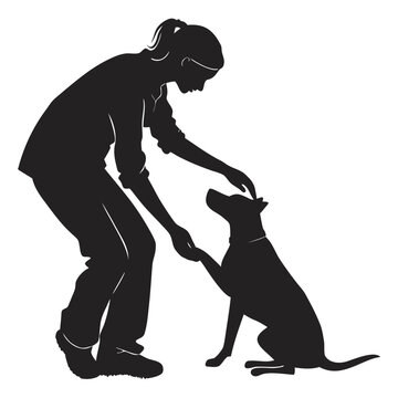 Woman training her dog to shake hands in a friendly and interactive outdoor setting at the park.