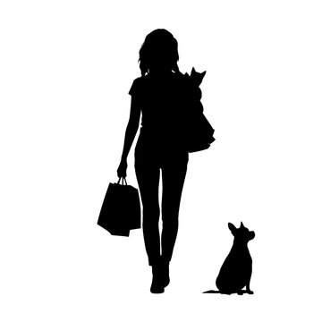 Shopper carries several paper bags while walking alongside a small dog on a bright white.