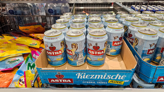 Astra kiezmische beer cans on supermarket shelf