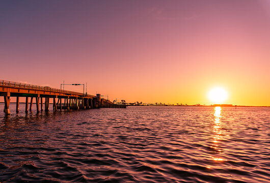Dunedin Causeway Bridge and Shimmering Ocean at Sunset, Florida