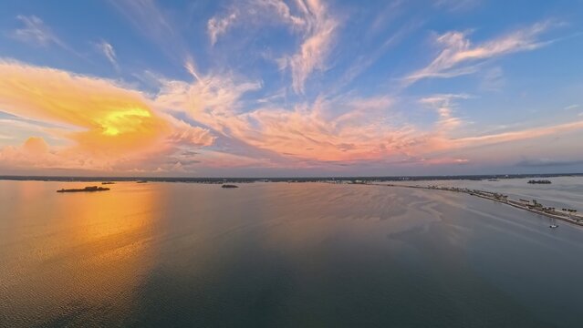 Aerial View of Dunedin Causeway Bridge and Waterfront Condos at Sunset, Florida