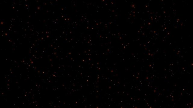 Glowing red floating embers and sparks on black background