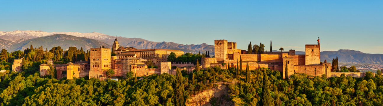 Panoramic view of the Alhambra with Sierra Nevada in the background taken from the famous Mirador de San Nicol&aacute;s, Granada, Andalusia, Spain.