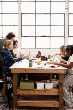 Kids and Teens in a hand-building clay class,