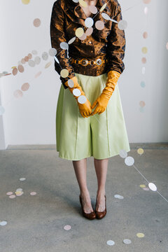 Cropped editorial styling with satin textures and pastel installation