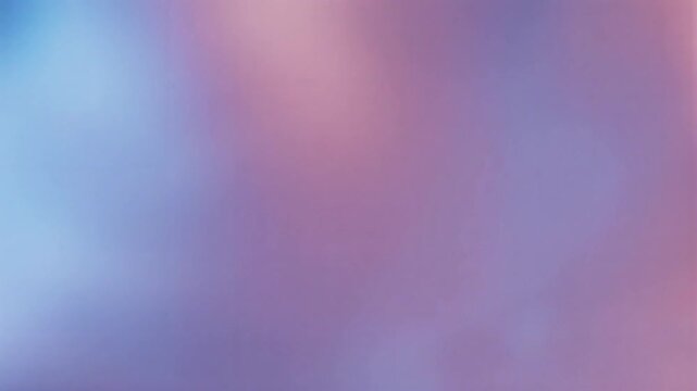 Soft gradient abstract motion video featuring blended pastel blue and warm peach light texture effects