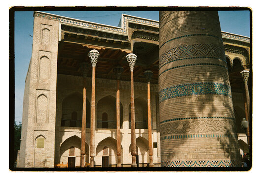 Historic mosque with turquoise tilework in Uzbekistan
