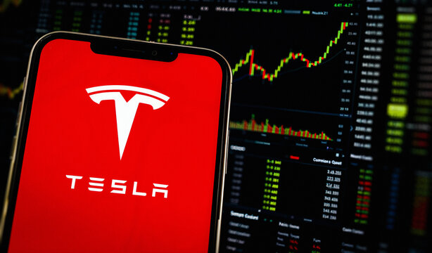 Smartphone Displays Tesla Logo (TSLA Shares) Stock Market Chart, London, UK - June 2026