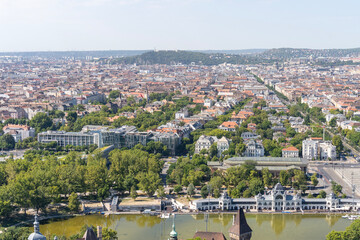 Fototapeta premium Panoramic cityscape of Budapest from the air with residential buildings and green areas