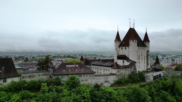 Historic Thun Castle Above Thun Town Under Cloudy Sky, Switzerland in Thun Castle, Thun, Switzerland