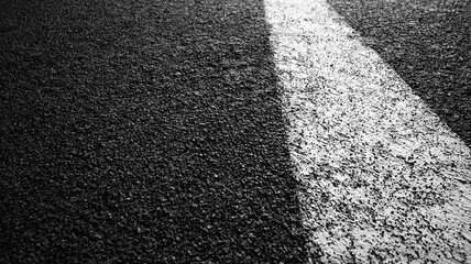 Fototapeta premium Asphalt Road Surface with White Lane Marking.