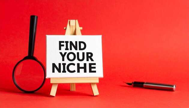 Motivational Business Concept &ldquo;Find Your Niche&rdquo; Displayed on White Canvas with Magnifying Glass on Red Background Representing Focus and Market Specialization