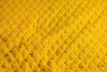 Naklejka premium Yellow quilted fabric