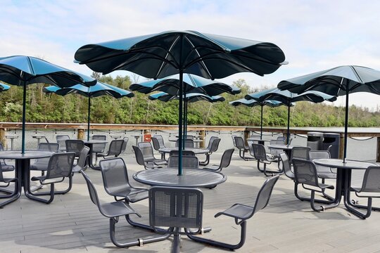 The tables and chairs on the patio.