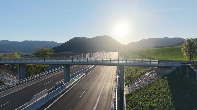 Drone footage showcasing a different perspective of the newly built D1 motorway section between Ivachnov&aacute; and Hubov&aacute;, highlighting its integration into the picturesque landscape of the Liptov region i