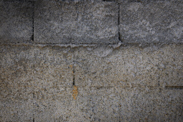 Fototapeta premium Textured concrete wall showcasing the raw beauty of industrial architecture in urban settings