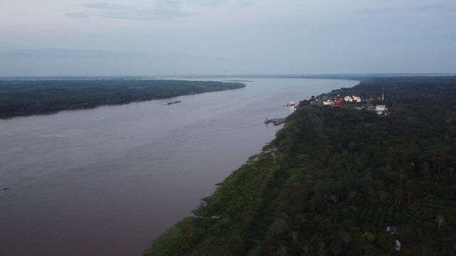 Santa clara de ojeal aerial view of the amazon river and rainforest near iquitos, peru