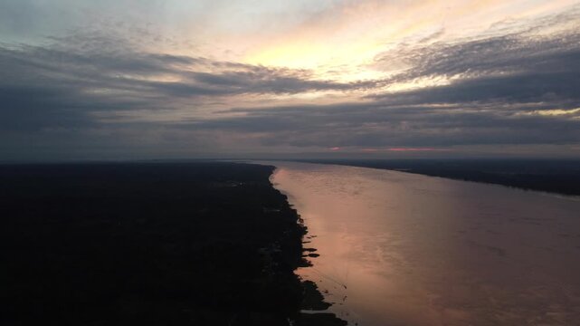 Santa clara de ojeal amazon river sunset scenery over iquitos peru