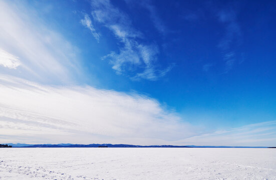 Lake Champlain frozen over and covered in snow, Burlington, Vermont, United States 