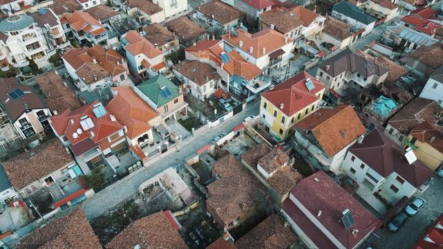 Aerial Drone Shot of Traditional European Town with Red Tiled Roofs and Narrow Cobblestone Streets