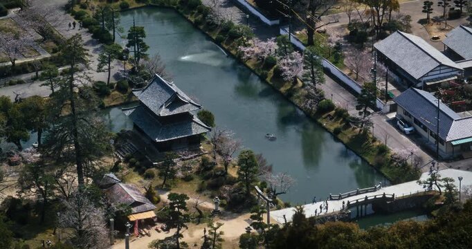 Aerial View Japanese Castle Grounds Moat And Cherry Blossoms in Hiroshima