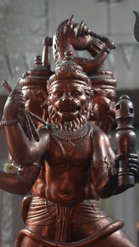 Three Faced Narasimha Idol in Traditional Hindu Temple Art and Sculpture