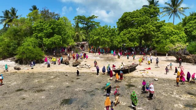 Drone Aerial View of Local People Walking on the Shore During Low Tide, January 21, 2025, Tumbatu Island, Zanzibar, Tanzania