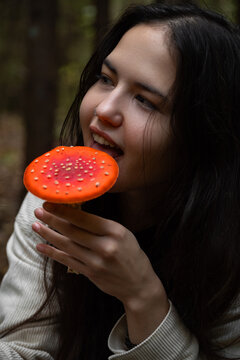 Woman eat amanita