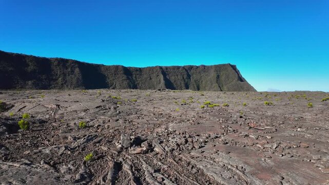 Scenic footage landscape of Piton de la Fournaise (Peak of the Furnace) 2632m, a volcano on the eastern side of Reunion island in the Indian Ocean and one of the most active volcanoes in the world.	