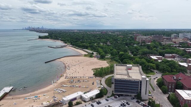 Aerial Pan of Clark Street Beach with Distant Chicago Skyline Evanston Illinois