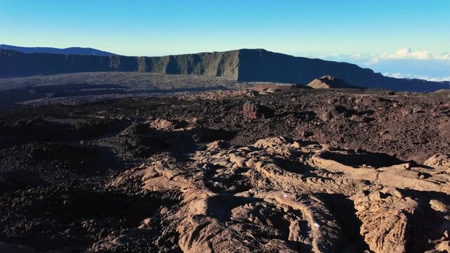 Scenic footage landscape of Piton de la Fournaise (Peak of the Furnace) 2632m, a volcano on the eastern side of Reunion island in the Indian Ocean and one of the most active volcanoes in the world.	